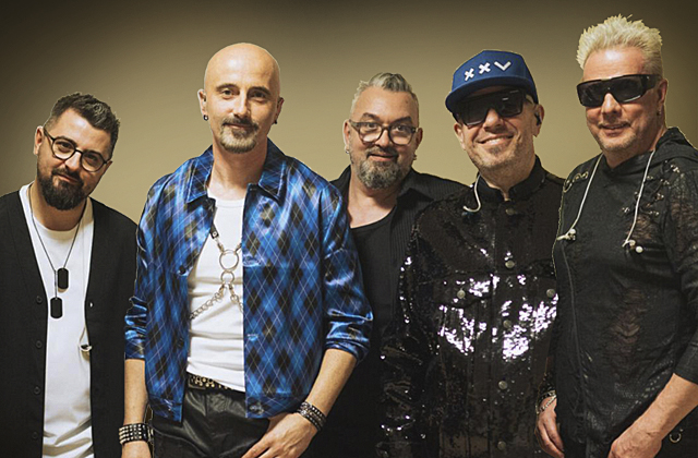 a group of men posing for a photo