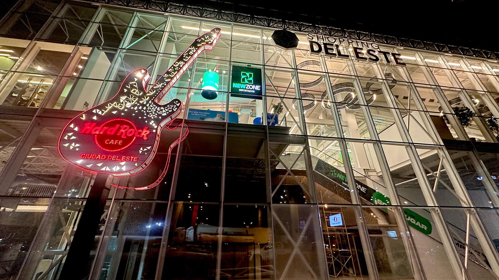 a building with a guitar sign