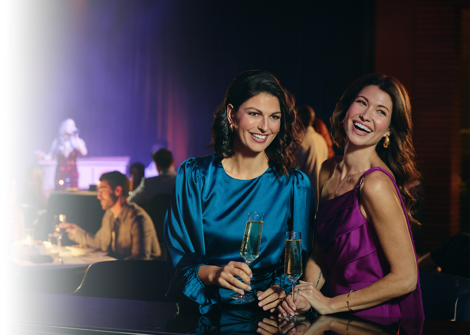 Two women enjoying Legends Lounge After Dark