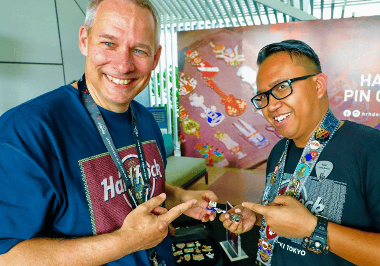 two men smiling at the camera