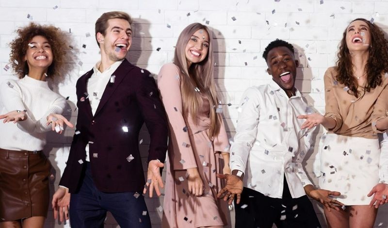 Group of young adults celebrating